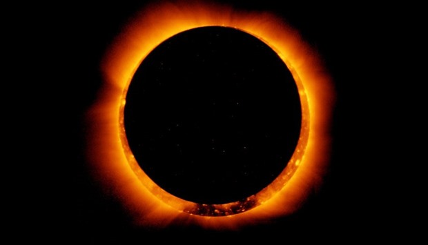 Sun spots are seen as the moon moves into a full eclipse position after reaching annularity during t