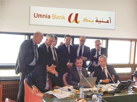 Sheikh Dr Khalid, al-Shaibei and Rahhou among others during the ordinary and extraordinary general assembly of Umnia Bank in Casablanca yesterday.