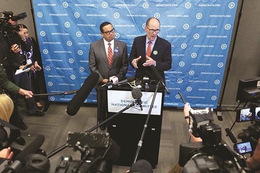 Ellison (left) and Perez speak with the press after the latter was elected chairman of the Democratic National Committee. Perez has named Ellison as deputy chairman.