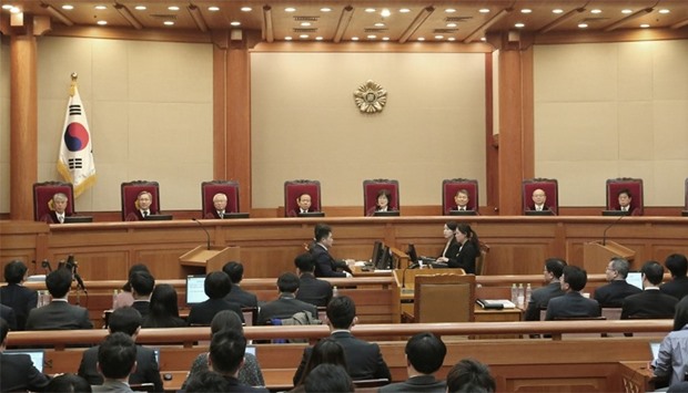 Judges of the Constitutional Court sit during the final hearing on whether to confirm the impeachment of President Park Geun-hye at the Constitutional Court in Seoul