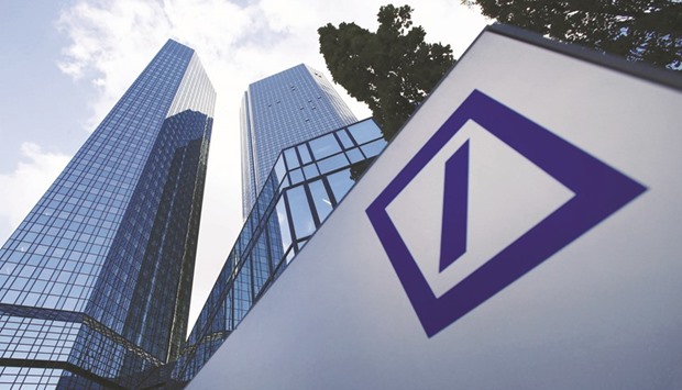 The headquarters of Deutsche Bank is seen in Frankfurt. The bank cut its 2016 bonus pool by almost 80%, a figure unmatched in the banku2019s recent history as it tries to recover from legal expenses that wiped out profit and eroded capital levels.