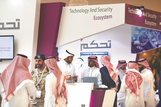 Saudis attend the second International Cyber Security Conference in Riyadh yesterday.