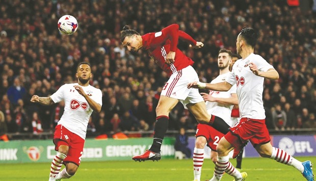 Manchester Unitedu2019s Zlatan Ibrahimovic scores the winner in the English League Cup final against Southampton at Wembley stadium in north London on Sunday. (AFP)