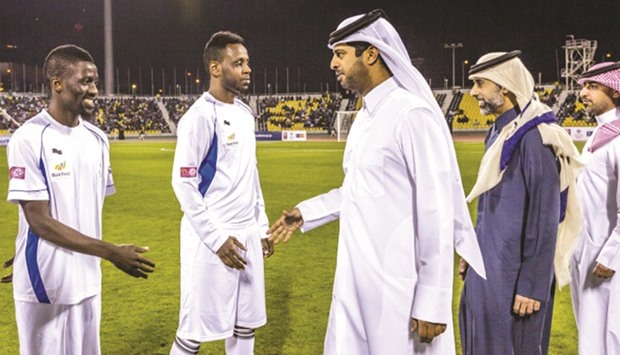 SCu2019s Assistant Secretary General Nasser al-Khater meets players before the opening game of the Workersu2019 Cup last Friday.