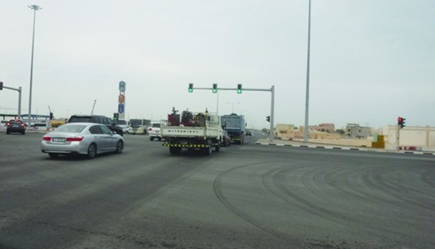 Vehicles passing through the newly opened stretch of Al Tarfa street in Duhail.