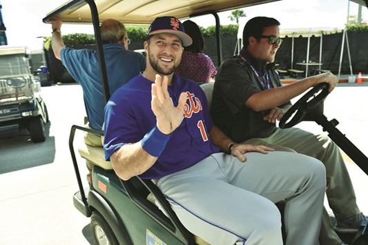 Mets player Tim Tebow is seen leaving on a golf cart after addressing a press conference. PICTURE: USA TODAY Sports
