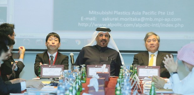 Qatar Chamber vice-chairman Mohamed bin Towar al-Kuwari (centre) is flanked by Jetro Dubai managing director Masami Ando (left) and Japanese ambassador Seiichi Otsuka during a business meeting at the chamberu2019s headquarters. PICTURE: Jayan Orma