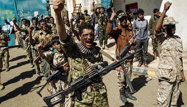 Newly recruited Houthi fighters chant slogans on Thursday during a gathering in Sanaa to mobilise more fighters to battlefronts to fight pro-government forces in several Yemeni cities.