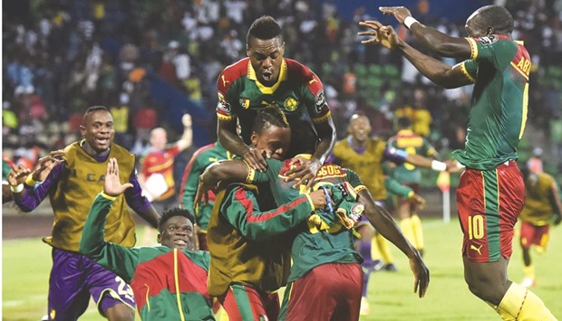 Cameroonu2019s players celebrate their second goal during the 2017 Africa Cup of Nations semi-final against Ghana.