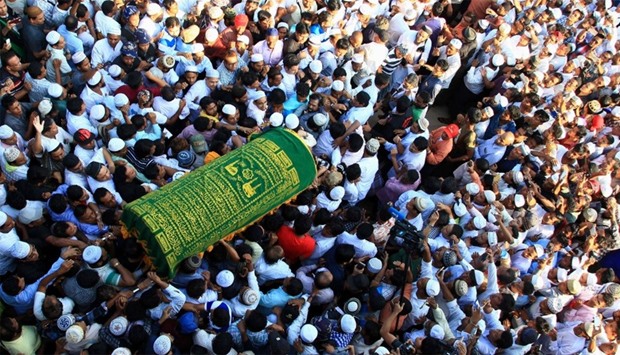 Supporters carry the coffin of Ko Ni, a prominent member of Myanmar's Muslim minority