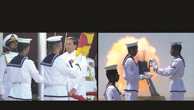 President Maithripala Sirisena, right, hoists the national flag during the islandu2019s 69th Independence Day celebrations in Colombo yesterday.   RIGHT: Sri Lankan Navy personnel fire a 25-gun salute to mark the islandu2019s 69th Independence Day in Colombo yesterday.