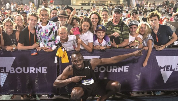 Bolt All-Stars Captain Usain Bolt of Jamaica poses in front of fans after his team won the Mixed 4x100m relay at the Nitro Athletics meet in Melbourne yesterday. (AFP)