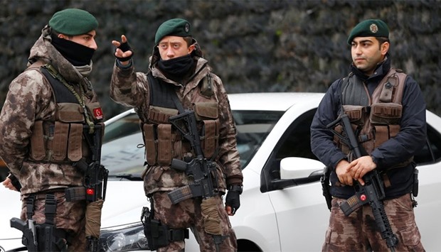Members of the Turkish police special forces stand guard