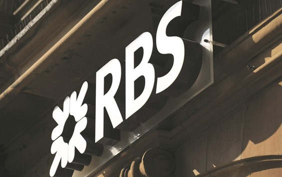 A signage is displayed at a branch of the Royal Bank of Scotland in Edinburgh. RBS agreed to pay $85mn to settle allegations it attempted to manipulate the ISDAfix interest-rate benchmark thatu2019s tied to the $544tn private derivatives market.