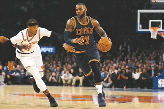 Cleveland Cavaliers forward LeBron James (R) drives to the basket past New York Knicks forward Carmelo Anthony during the first quarter of their NBA game at Madison Square Garden. PICTURE: USA TODAY Sports