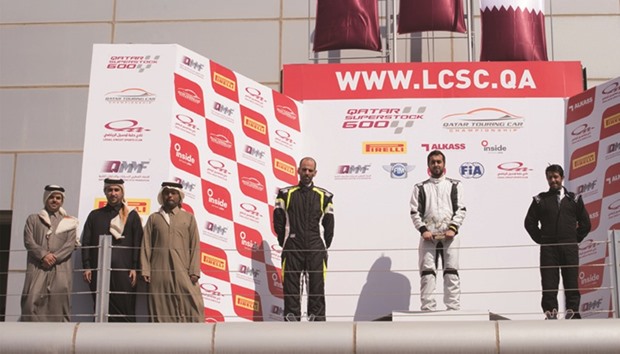 Podium ceremony for the first race of the Qatar Touring Cars Championship.