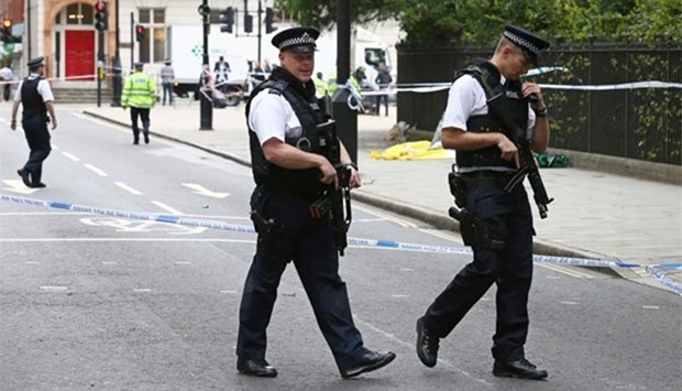 Armed police walk past a crime scene in London's Russell Square following a knife attack in this file picture.