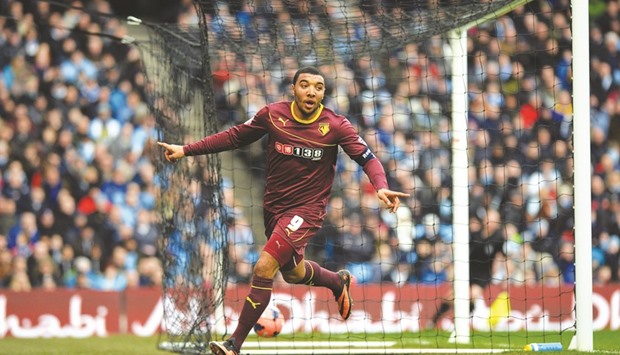 In this January 25, 2014, picture, Watfordu2019s Troy Deeney celebrates his goal during their FA Cup fourth round match against Manchester City in Manchester.  (AFP)