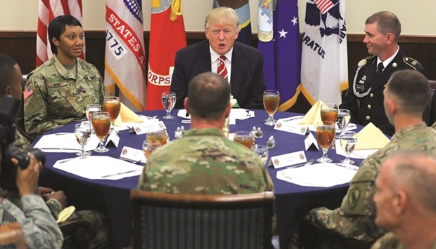 Trump attends a lunch with members of the US military during his visit to the US Centcom and Special Operations Command (SOCOM) headquarters in Tampa, Florida.