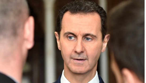 President Bashar al-Assad speaks to a group of Belgian reporters.