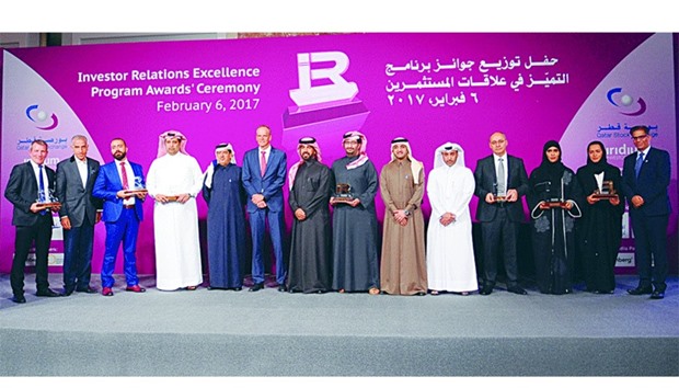 Al-Mansoori and al-Emadi along with the awardees.