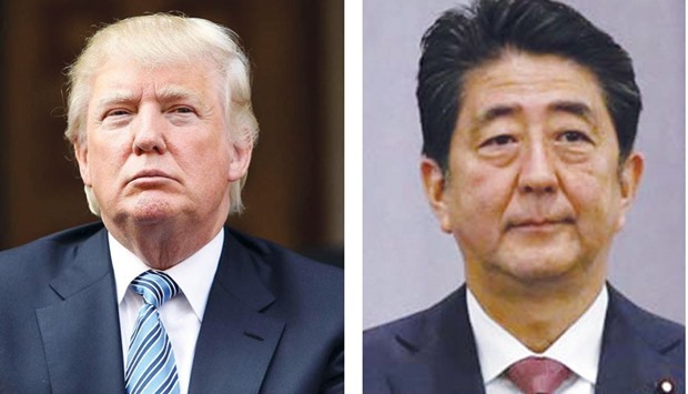 Donald Trump, left, and Shinzo Abe ... teeing off in diplomacy.