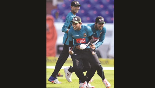 Bangladesh captain Mushfiqur Rahim takes part in a practice session with his teammates ahead of the Test match against India in Hyderabad yesterday. (AFP)
