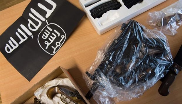 Confiscated items are on display during a press conference in Gottingen, central Germany, on Thursday. An Algerian and a Nigerian suspected of preparing an attack were taken into custody during a raid, police said.