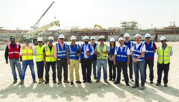 The BWI delegation is seen during a project site visit earlier this month.