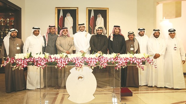 Qatar Racing and Equestrian Club (QREC) deputy chairman Hamad bin Abdulrahman al-Attiyah, general manager Nasser Sherida al-Kaabi, Ali bin Khatem al-Mehshadi and other officials at the QREC after Notalot won the Marmi Cup yesterday. PICTURE: Juhaim