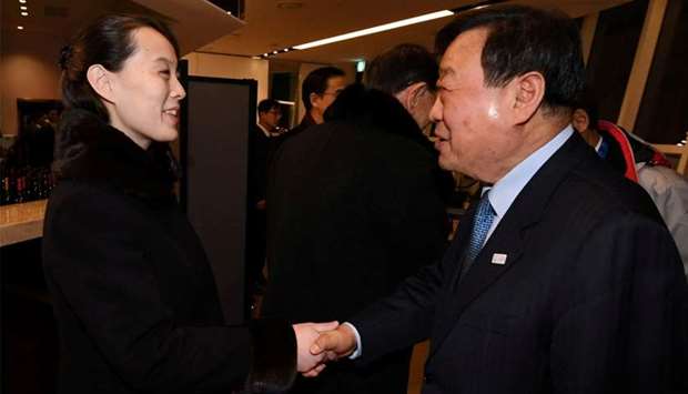 Kim Yo Jong, the sister of North Koreas leader Kim Jong Un, shakes hands with president of the Pyeongchang 2018 Organising Committee Lee Hee-beom during a banquet hosted by the Unification Ministry in Gangneung