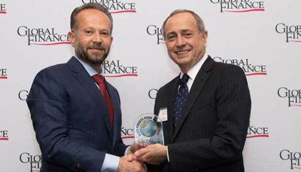 Chaouki Daher, general manager and head of Private Banking at ibq, recieves the award from Global Finance.