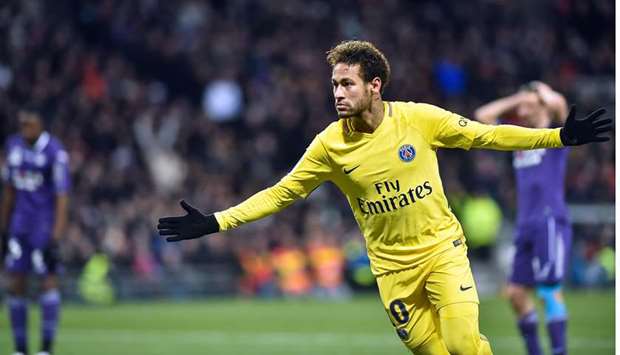 Paris Saint-Germainu2019s Brazilian forward Neymar Jr celebrates after scoring against Toulouse (TFC) during their Ligue 1 match at the Municipal stadium in Toulouse yesterday. (AFP)