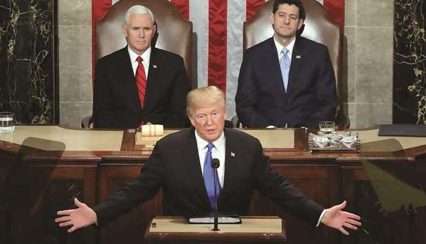 President Donald J Trump delivers the State of the Union address as Vice President Mike Pence and Speaker of the House US Rep Paul Ryan (R-WI) look on in the chamber of the House of Representatives in Washington, DC.