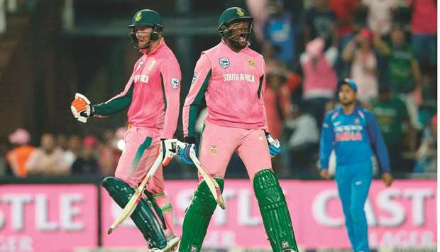 South African batsmen Heinrich Klaasen (left) and Andile Phehlukwayo celebrate after winning the fourth ODI against India in Johannesburg yesterday. (AFP)
