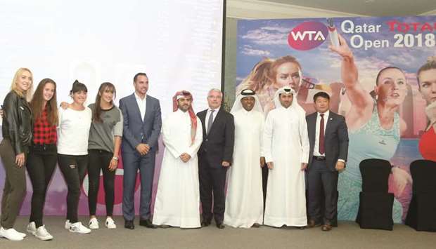 Players Elena Vesnina, Daria Kasatkina, Ons Jabeur, Fatma al-Nabhani, Qatar Tennis, Badminton and Squash Federation (QTBSF) board director Karim Alami, QTBSF secretary-general Tariq Darwish Zainal, tournament director Saad al-Mohannadi and Total officials pose after the official draw ceremony yesterday. PICTURE: Jayan Orma