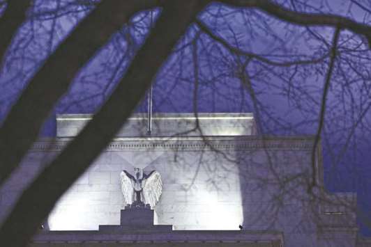 A view of the Federal Reserve building in Washington, DC. Economists at banks and consulting companies are busy marking up their economic forecasts in response to the nearly $300bn spending package signed into law Friday, saying it will help lift growth in 2018 to well above the 1.8% rate the Fed reckons is the economyu2019s long-run potential.