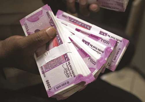 The rupee closed at 64.03 per dollar yesterday, down 0.69% from its previous close of 63.59