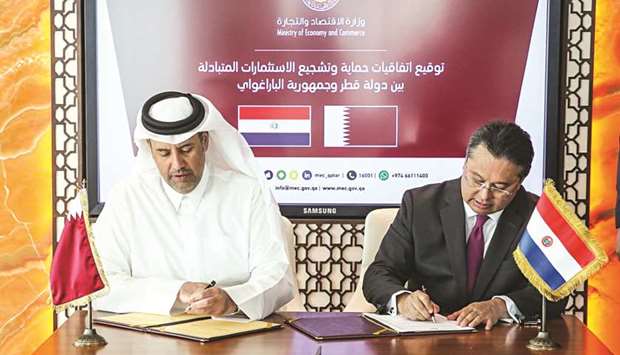 HE the Minister of Economy and Commerce Sheikh Ahmed bin Jassim bin Mohamed al-Thani and the Minister of Industry and Commerce of Paraguay, Gustavo Leite, signing the agreement in Doha yesterday.