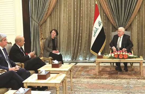Franceu2019s Foreign Minister Jean-Yves Le Drian meets with Iraqi President Fuad Massum in the capital Baghdad, yesterday.