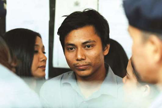 Detained Reuters journalist Kyaw Soe Oo is seen during a break at the court hearing in Yangon.