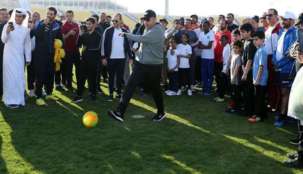 HE the Prime Minister and Interior Minister Sheikh Abdullah bin Nasser bin Khalifa al-Thani participates in the National Sports Day activities at Qatar Sports Club. PHOTO Ram Chand