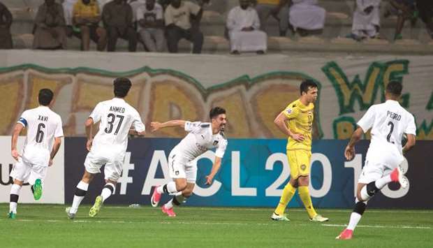 Al Saddu2019s Baghdad Bounedjah celebrates scoring against Al Wasl in Dubai yesterday.