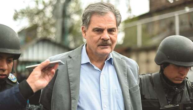 Guatemalan former minister of public finances, Alberto Fuentes Knigth, is arrested under corruption charges in Guatemala City yesterday. Guatemalan authorities arrested a former president and nine ministers of his former government on corruption charges.