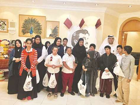 Commercial Bank volunteers distributed special National Sport Day gifts at the Qatar Society for Rehabilitation of Special Needs.