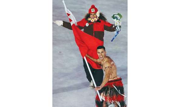 Tongau2019s Pita Taufatofua leads his countryu2019s delegation during the opening ceremony of the 2018 Winter Olympic Games in Pyeongchang on Friday. (AFP)