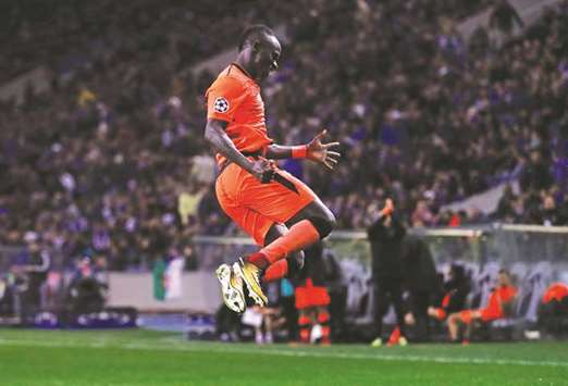 Liverpoolu2019s Sadio Mane celebrates after completing his hat-trick during their Champions League match against FC Porto on Wednesday. (Reuters)