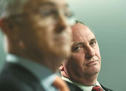 Australiau2019s Deputy Prime Minister Barnaby Joyce (right) looking at Prime Minister Malcolm Turnbull during a press conference in Sydney in a file picture.