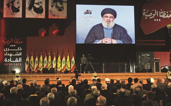 Lebanese Hezbollah Leader Hassan Nasrallah delivers a televised speech during a ceremony held by the party in Beirut, yesterday.