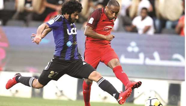 Action from the match between Al Rayyan (in red) and Al Sailiya (in black and blue) yesterday. PICTURE: Othman Iraqi